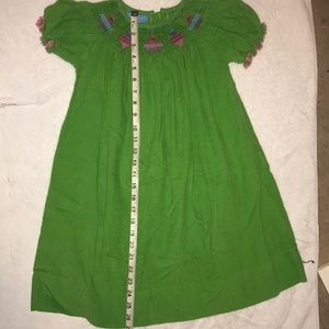 Christmas dress in vibrant green corduroy smocked